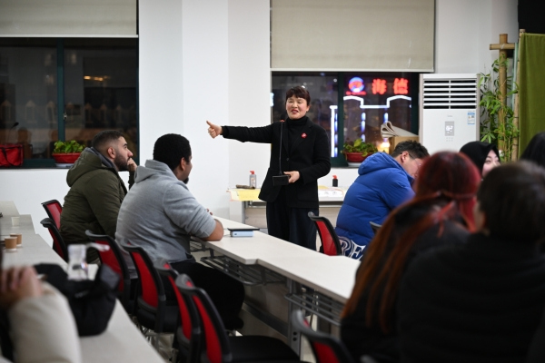 Expats attend Chinese language class in Jinhua