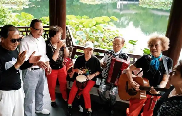 Silver-haired rock band members live life in full bloom