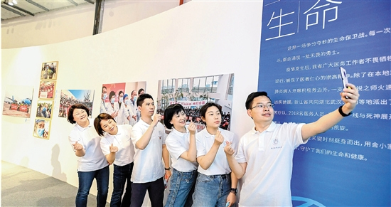 Photo exhibition on Zhejiang's effort in COVID-19 crisis unveiled in Hangzhou