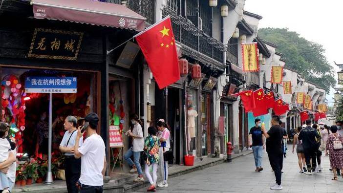 National flags fly to celebrate the upcoming National Day holiday