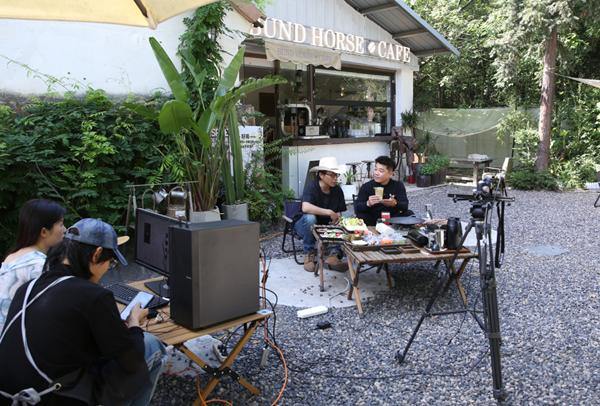 Caffeine and Creativity: Xu Jiezi's journey to building coffee empire in Huzhou